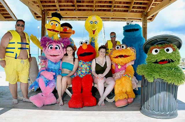 Family with Sesame Street characters at Beaches Resorts