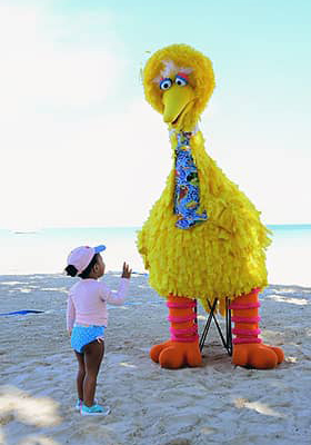 Little girl with Big Bird at Beaches Resorts